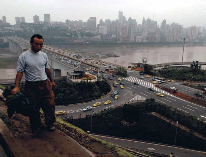 A horticultural worker in Chongqing. For many years, urban planning in the Chinese megacity  has been anything but pedestrian-friendly
